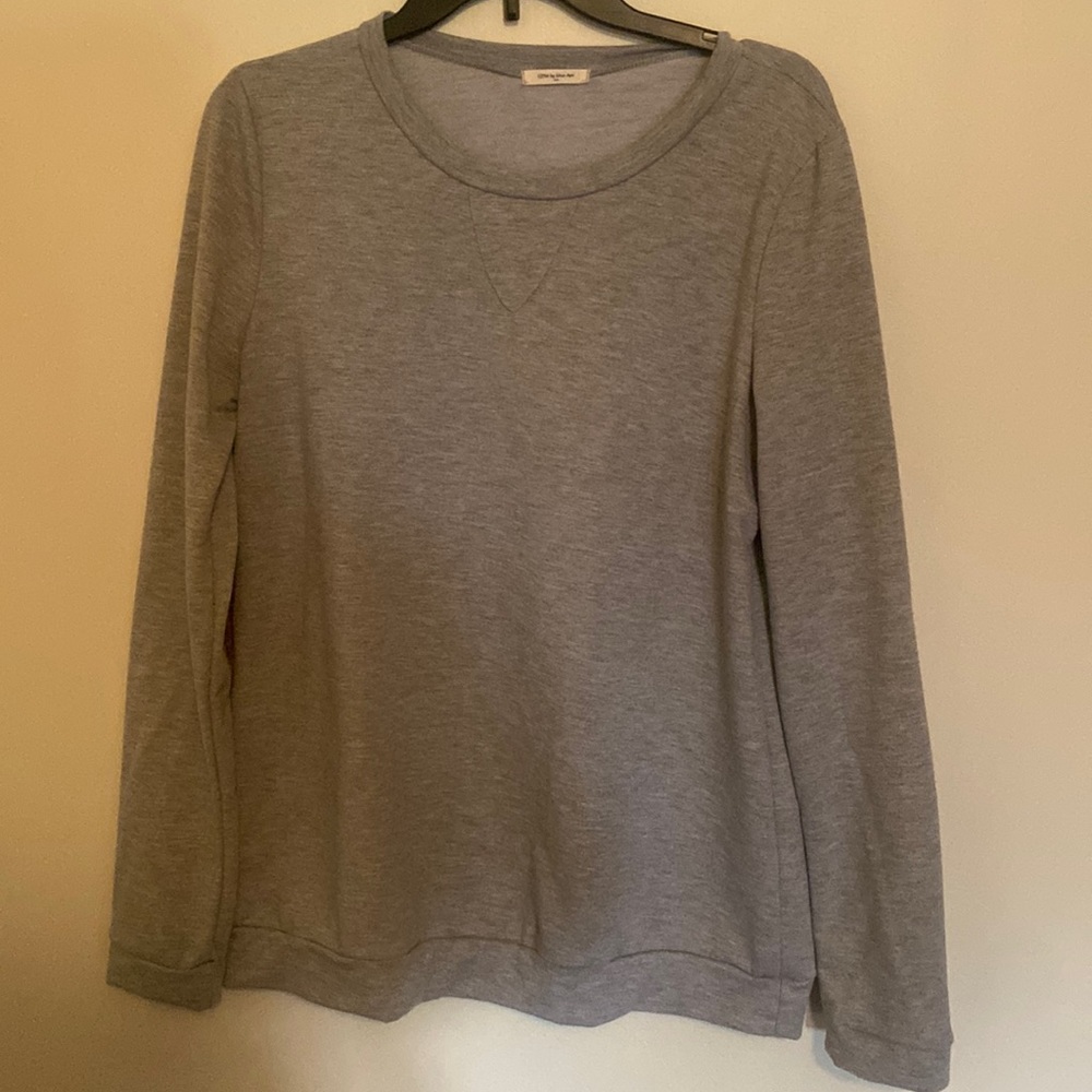 Grey shirt with glitter patches on sleeves